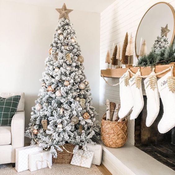 Christmas mantel styled with mini ombre bottle brush trees and a flocked tree