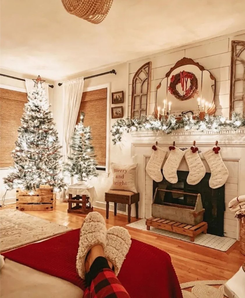 Christmas stockings hanging from a bookshelf in a living room